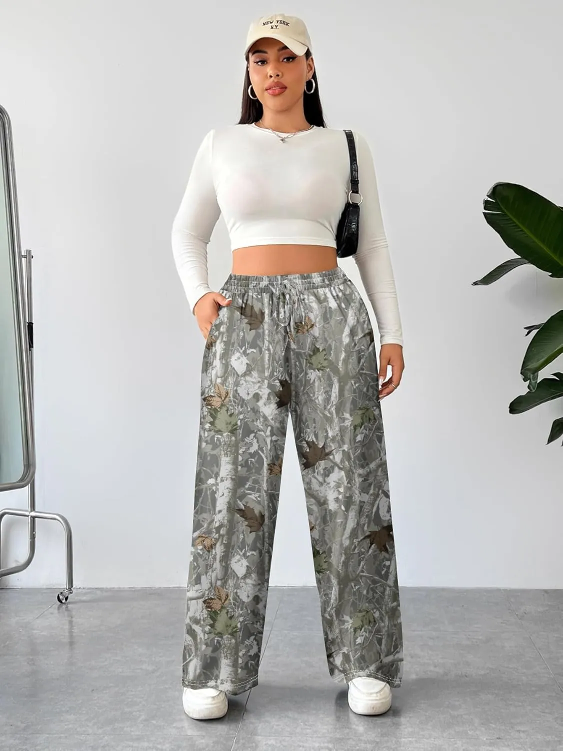 WDIRARA Women's Plus Size Leopard Print Pants Elastic High Waist Trousers with Pockets