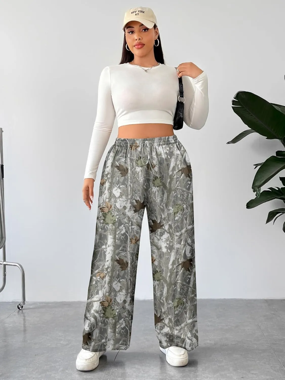 WDIRARA Women's Plus Size Leopard Print Pants Elastic High Waist Trousers with Pockets